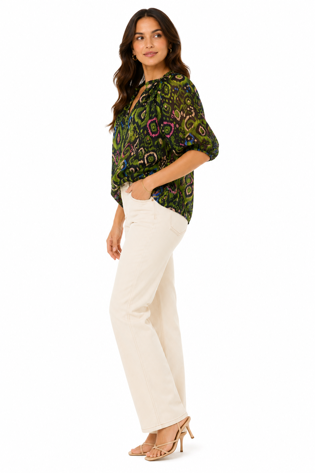 Philosophy blouse features a vibrant geometric design and puffy short sleeves