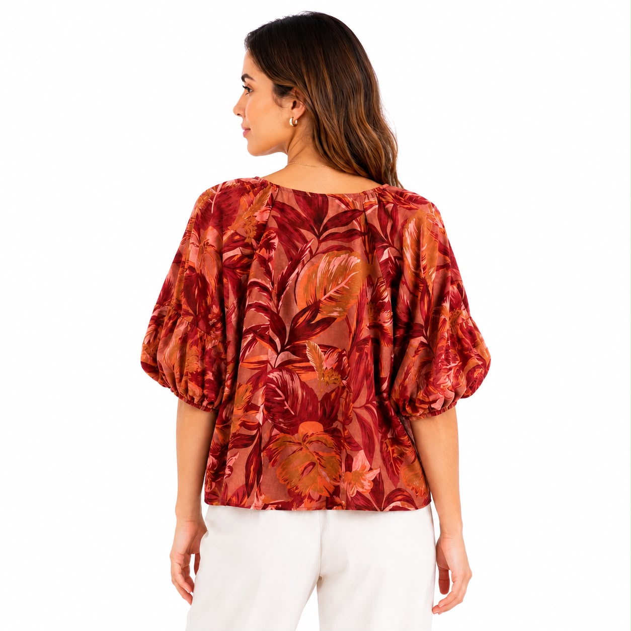 Joie blouse features a striking tropical floral print
