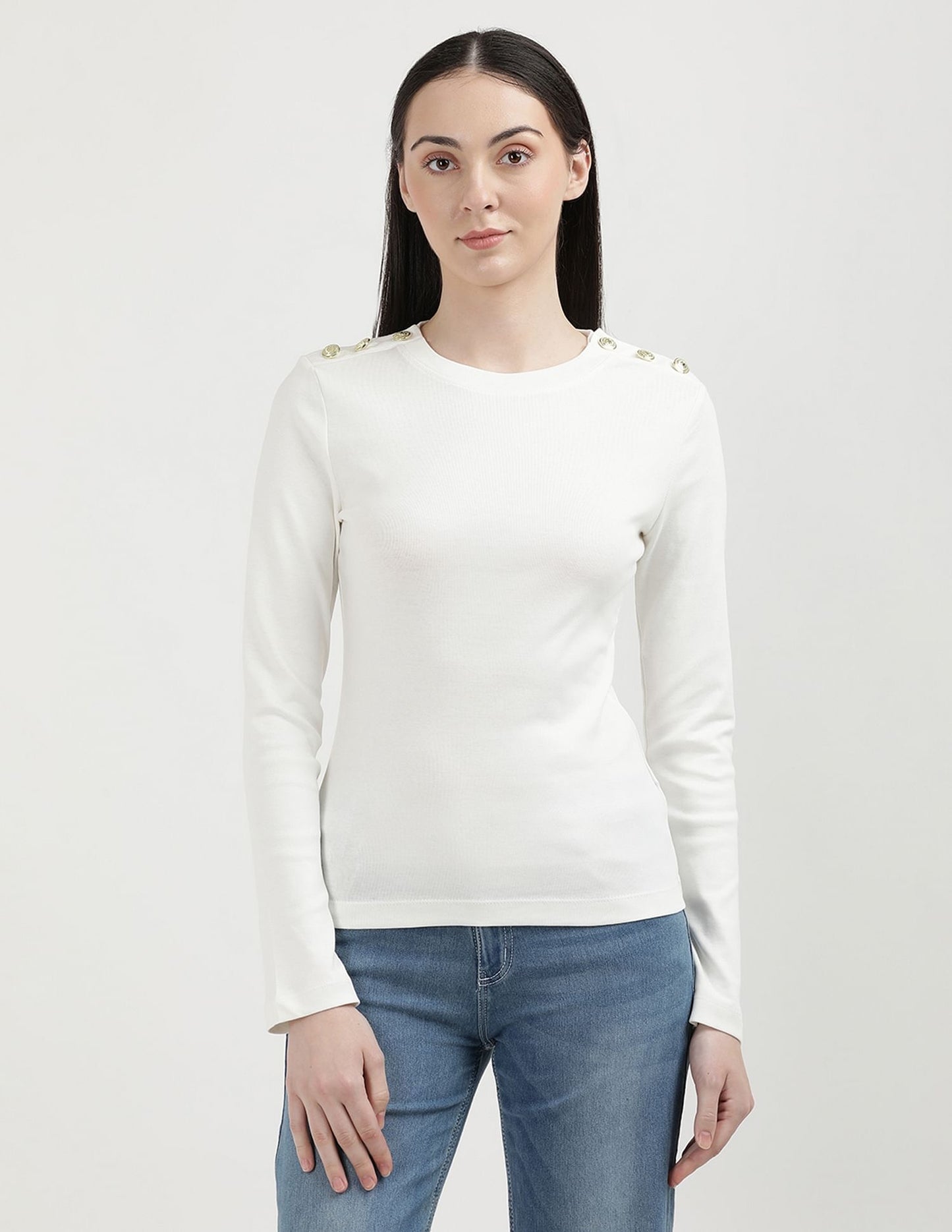Camiseta favorita con botones de oro macizo