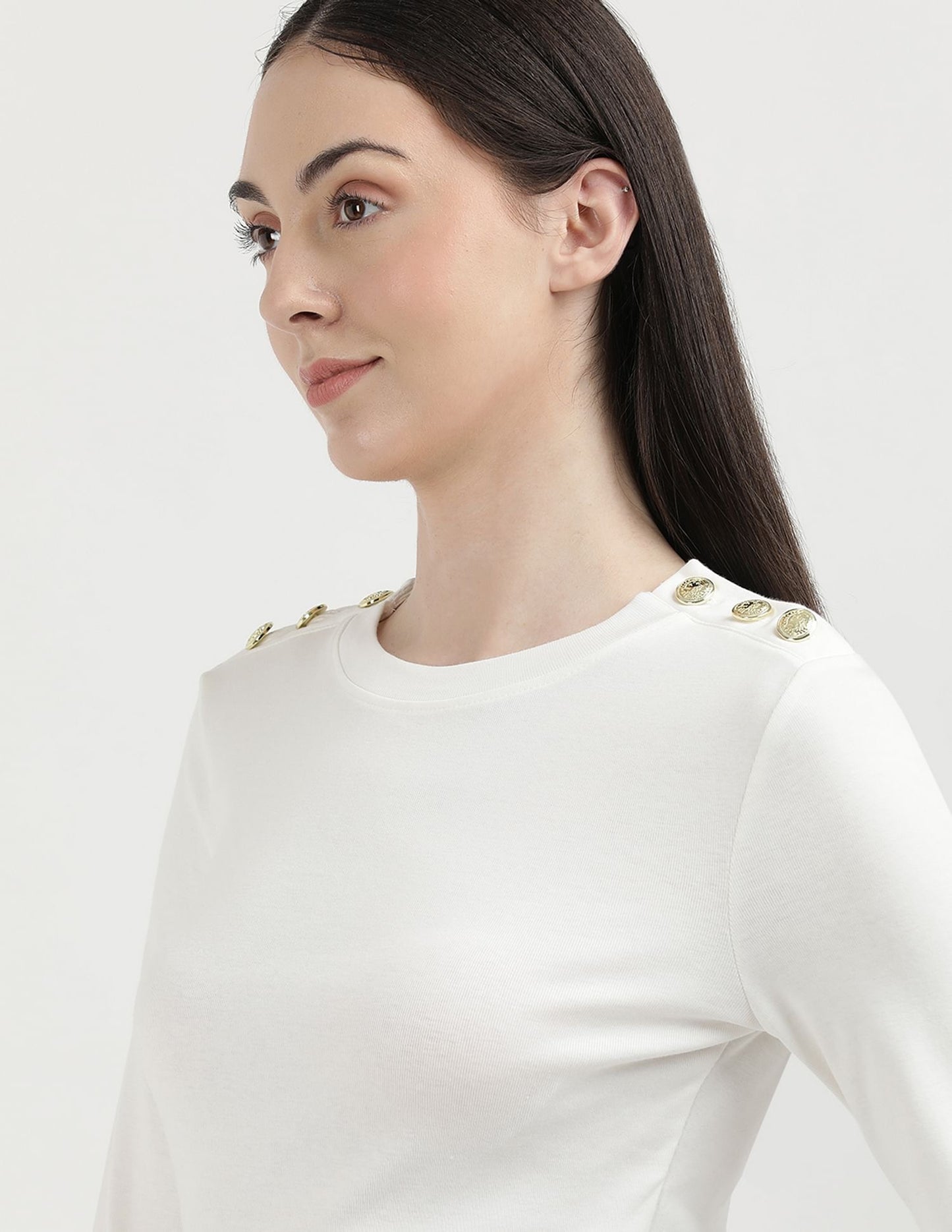 Camiseta favorita con botones de oro macizo