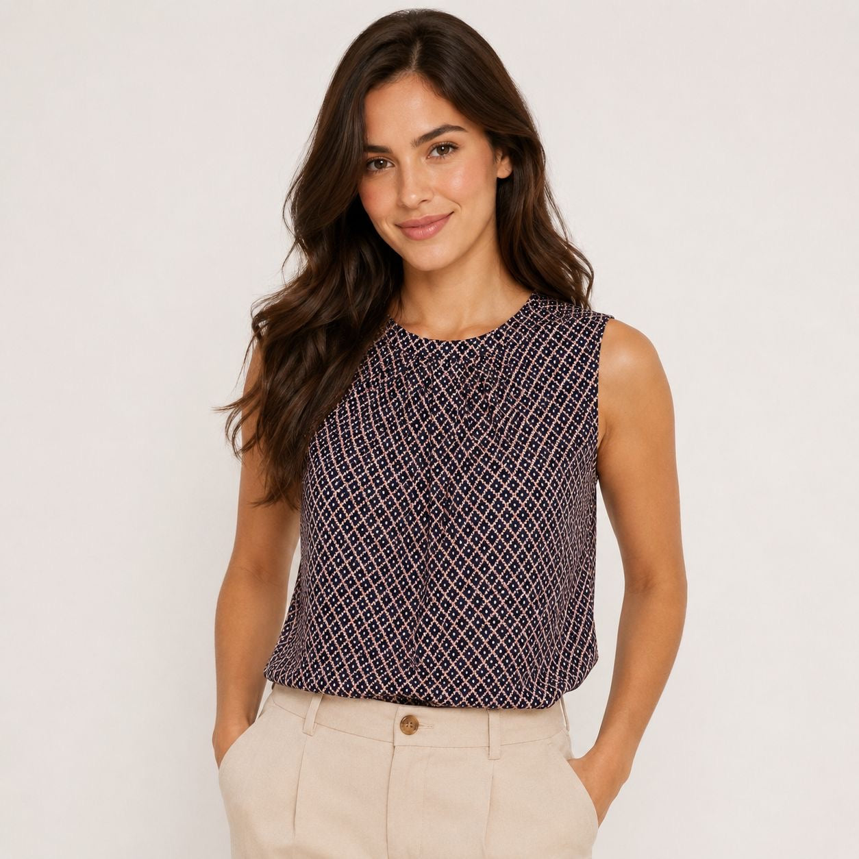 Calvin Klein sleeveless blouse with pleated collar and geometric print