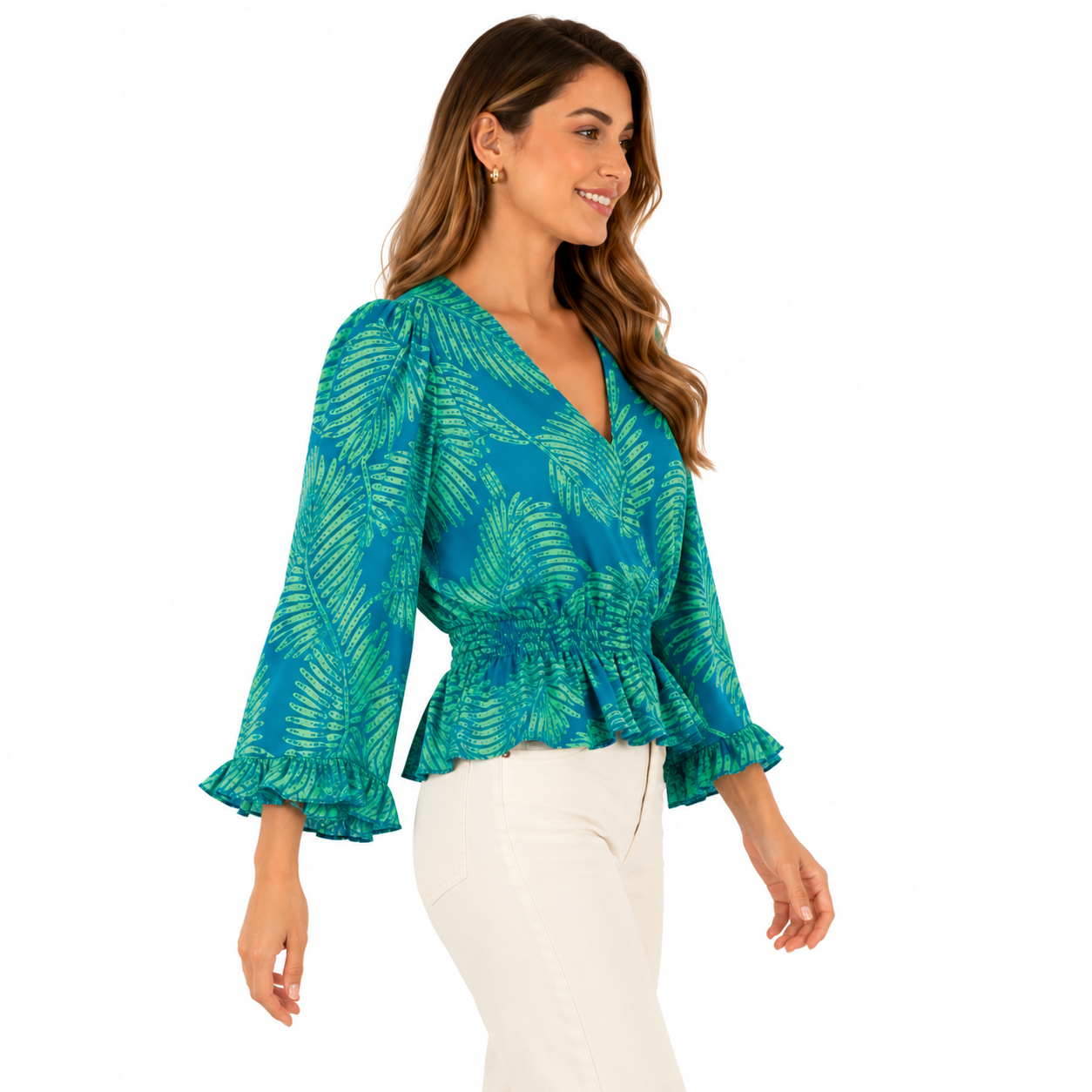 AUW blue blouse has a tropical print of green leaves