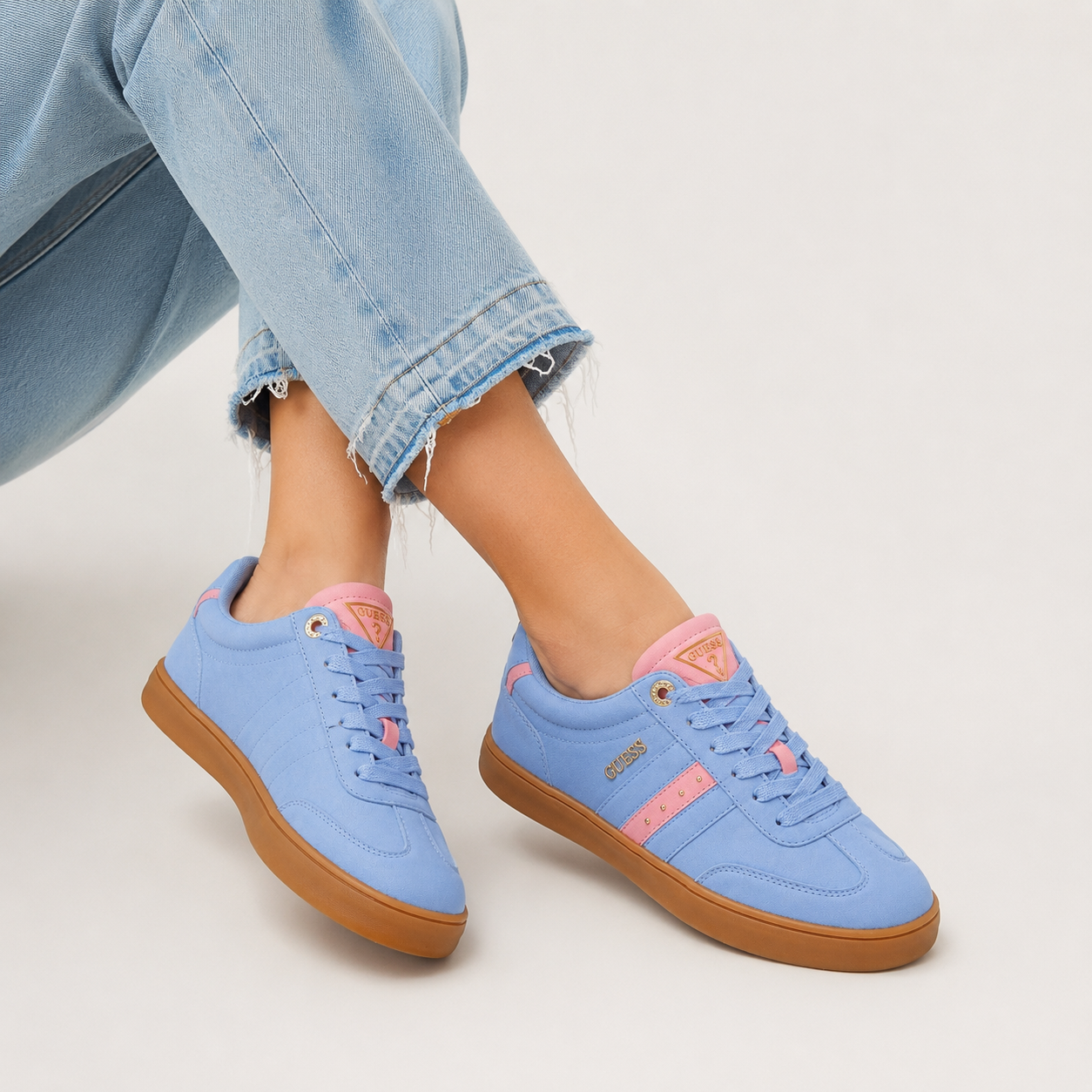 Guess sneakers for women in light blue with pink details