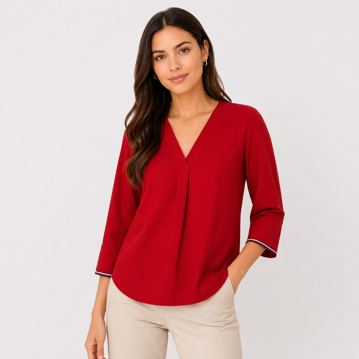 Tommy Hilfiger red blouse with V-neck and three-quarter sleeves with striped details.