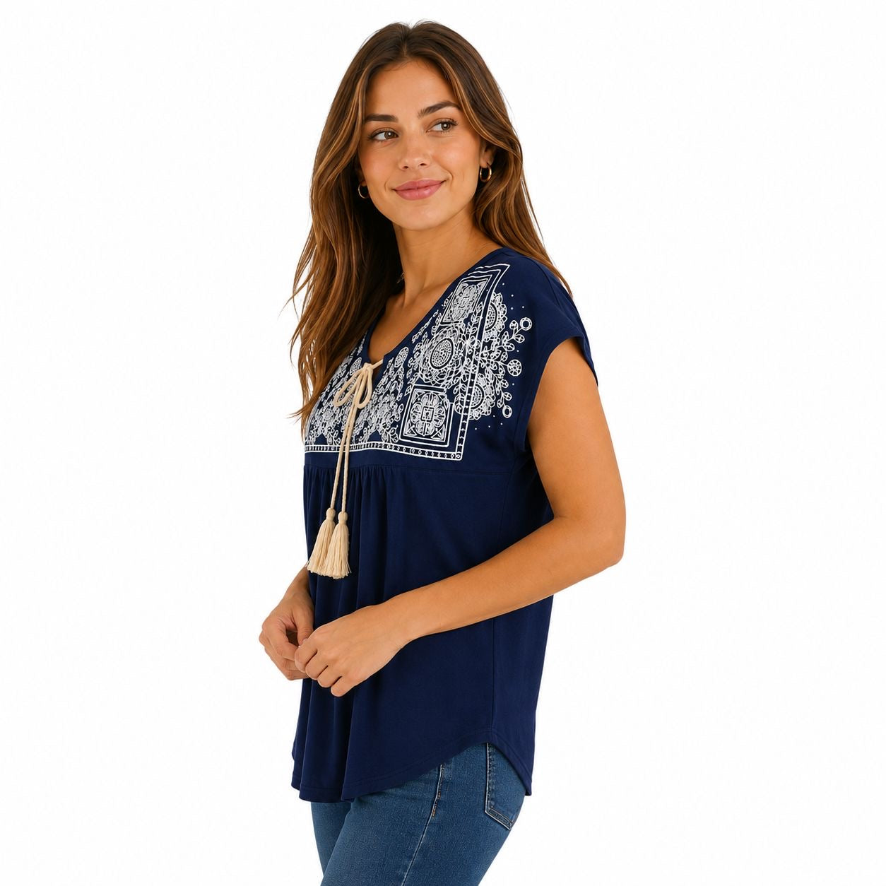 Agaci blouse is navy blue with white embroidery on the collar