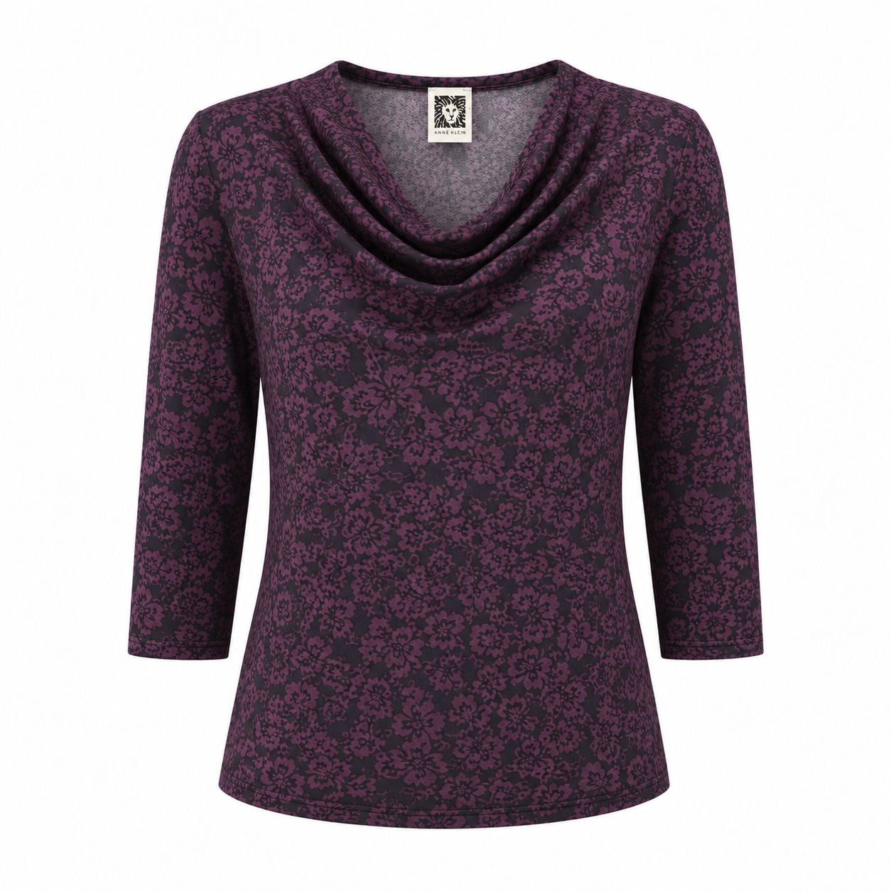 Anne Klein brand blouse has a dark floral design