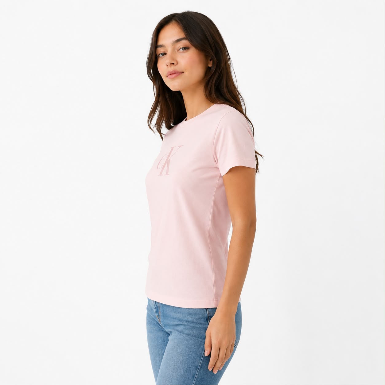Calvin Klein t-shirt is pink and features a monogram logo