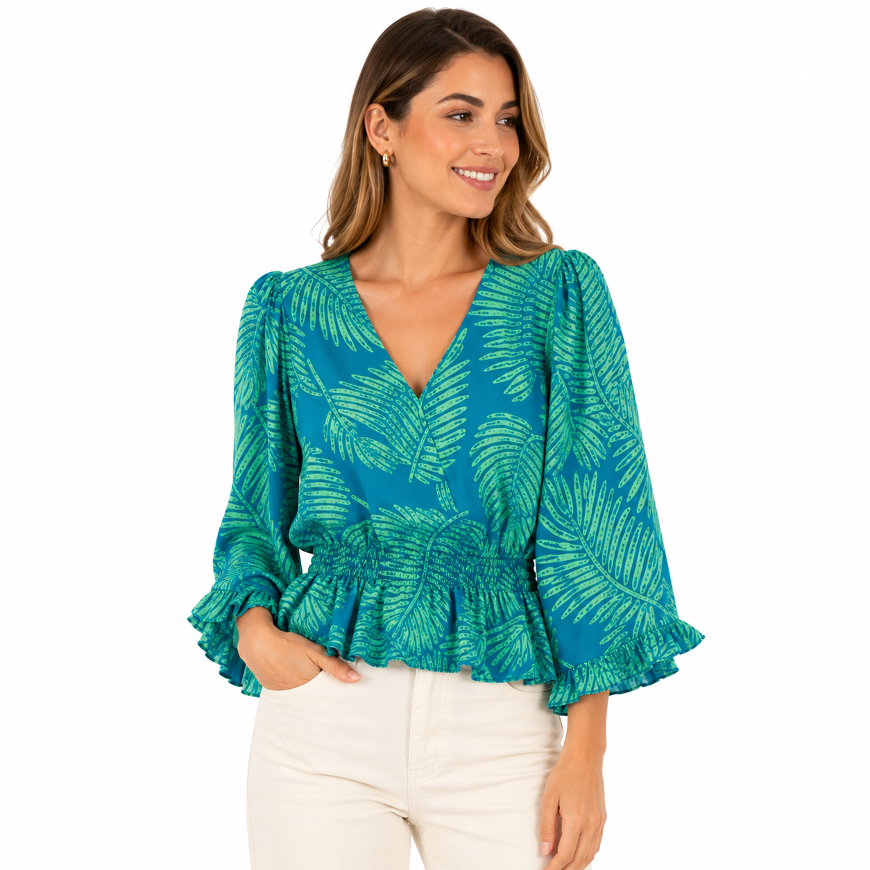AUW blue blouse has a tropical print of green leaves