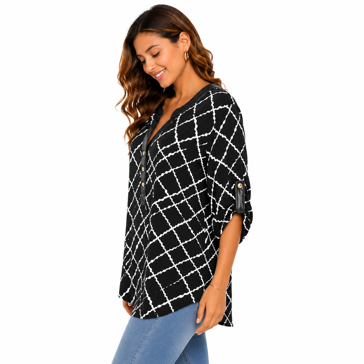 Anne Klein blouse has a geometric design in black and white