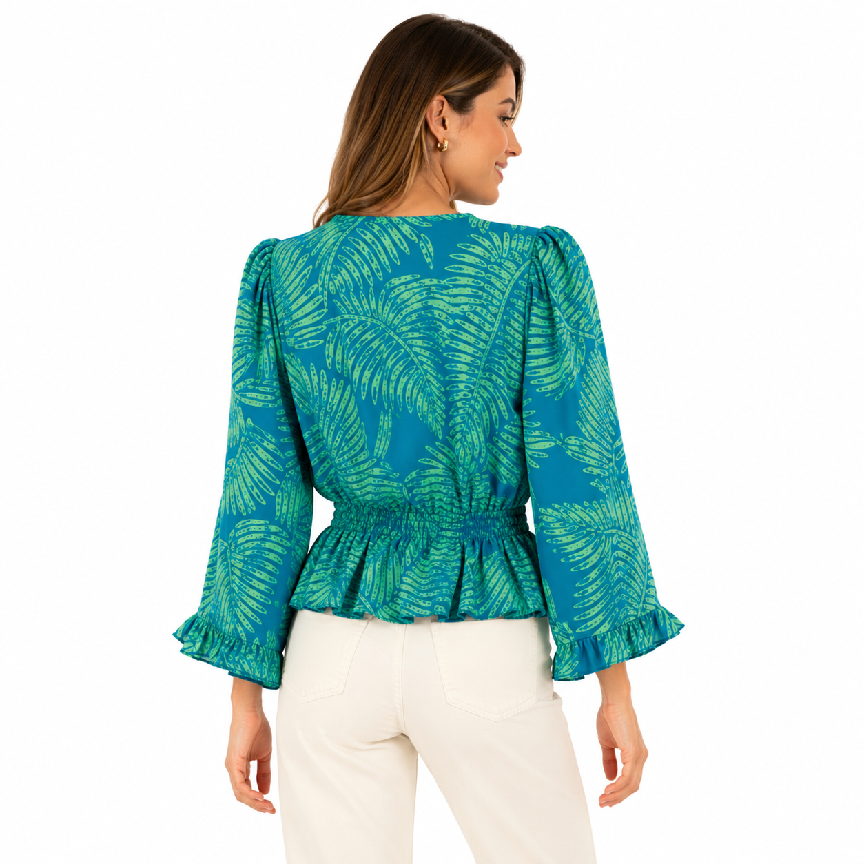 AUW blue blouse has a tropical print of green leaves