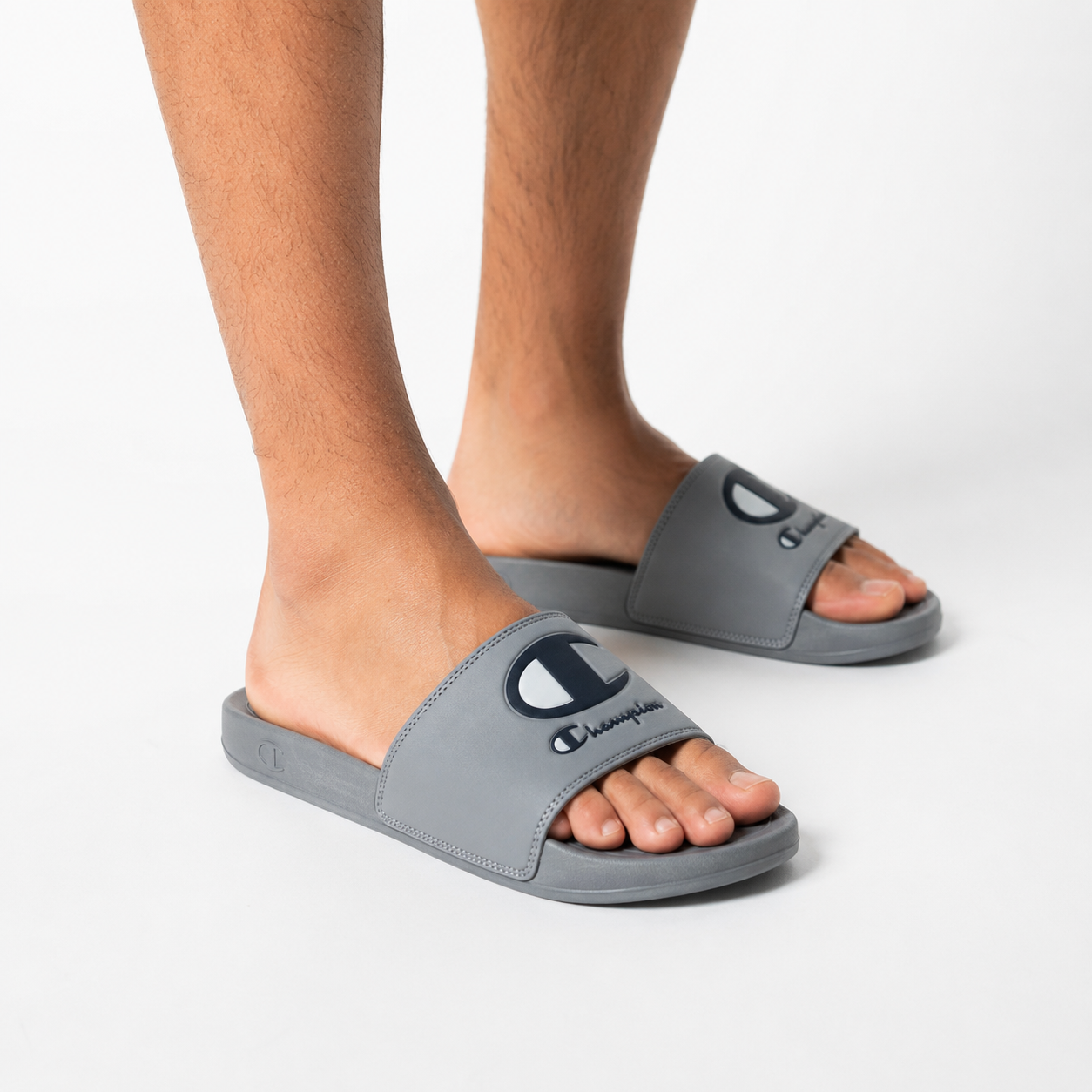 Champion slide-type flip-flops in gray sandals