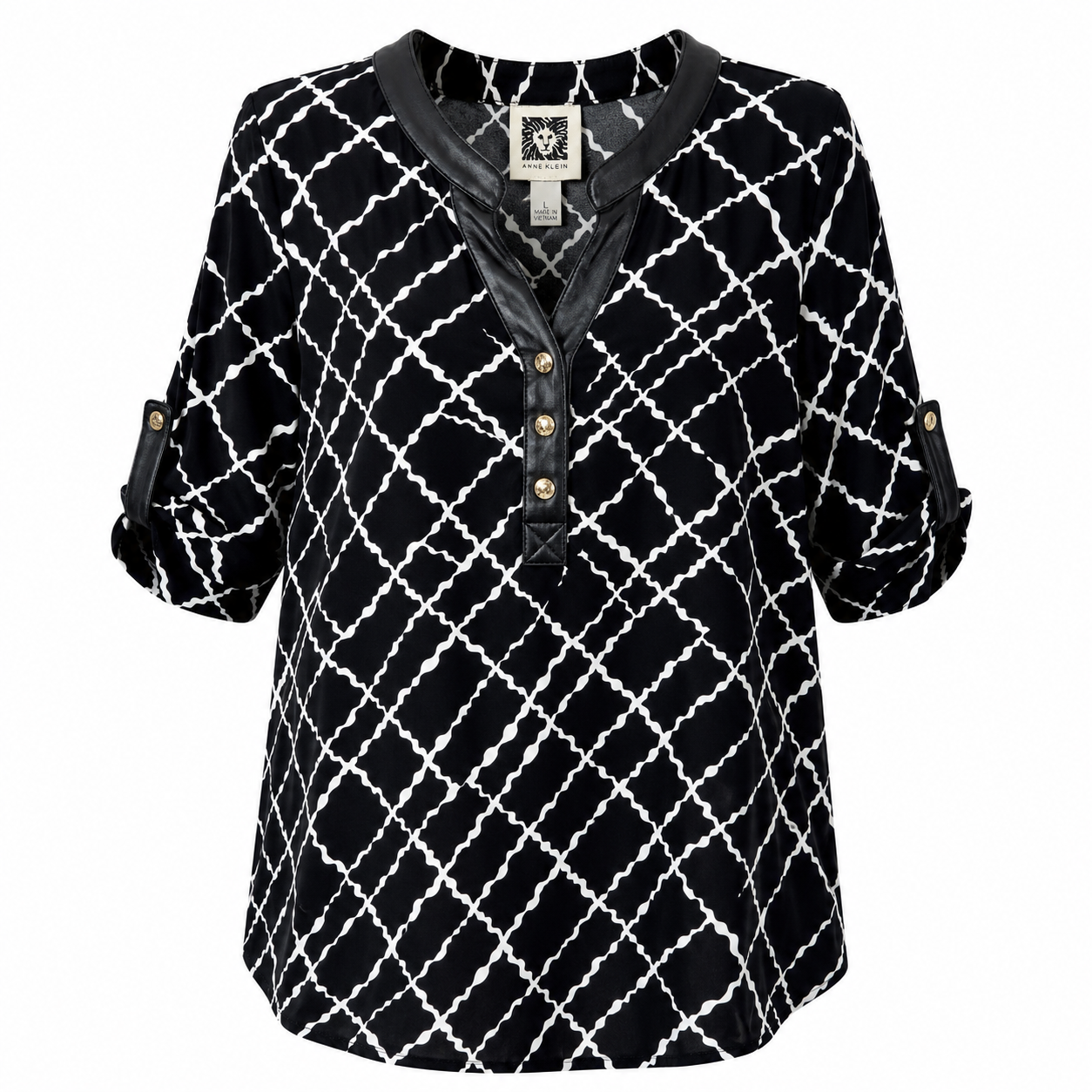 Anne Klein blouse has a geometric design in black and white