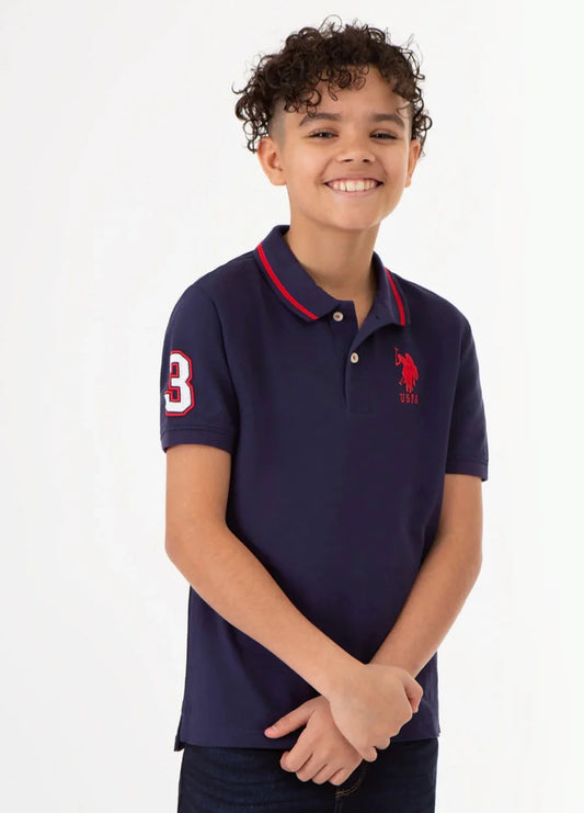 U.S. Polo Assn. Boy’s Multi Color Logo Solid Pique Polo Shirt