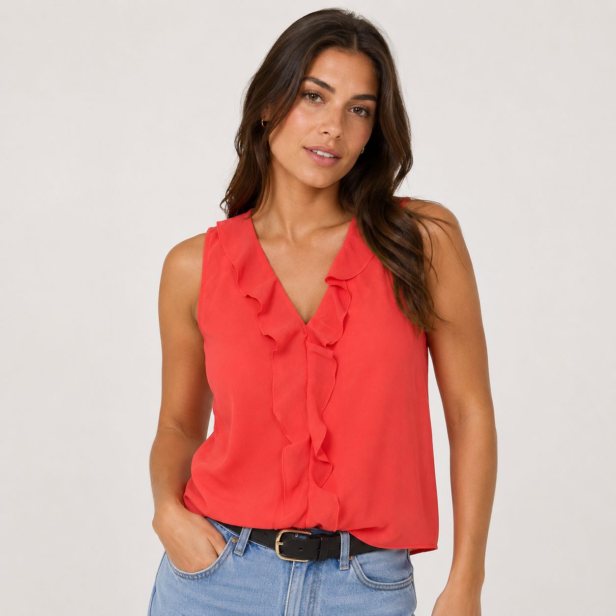 Calvin Klein blouse stands out for its sleeveless feminine design