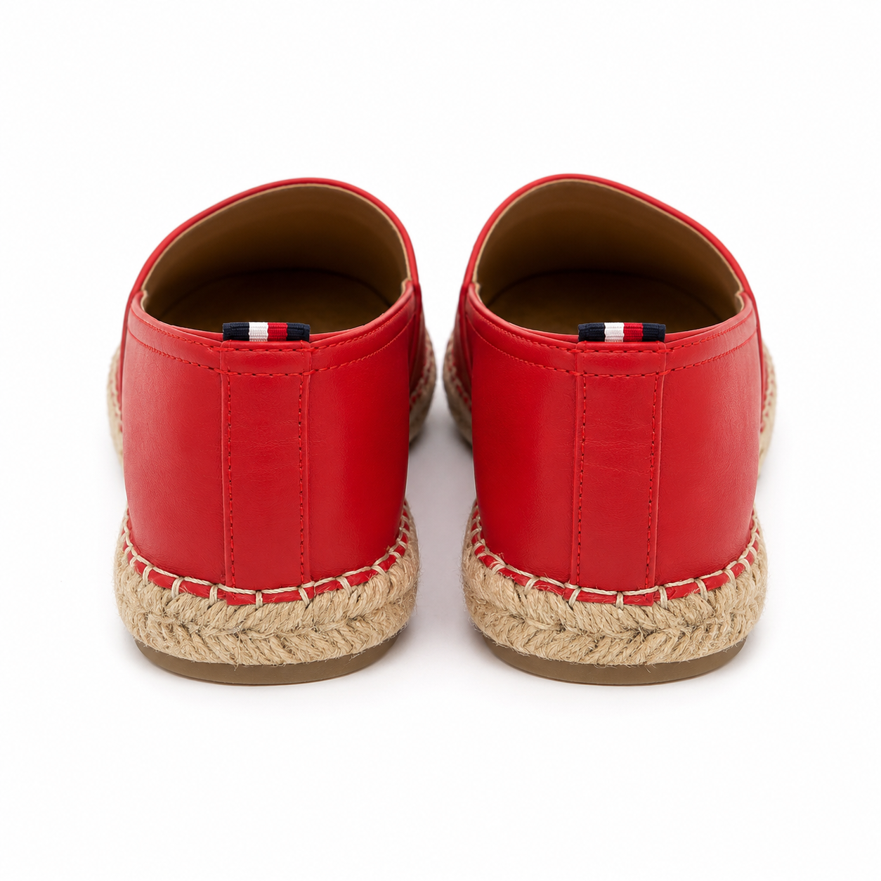 Tommy Hilfiger red espadrilles with the embroidered "TH" logo and a jute sole.