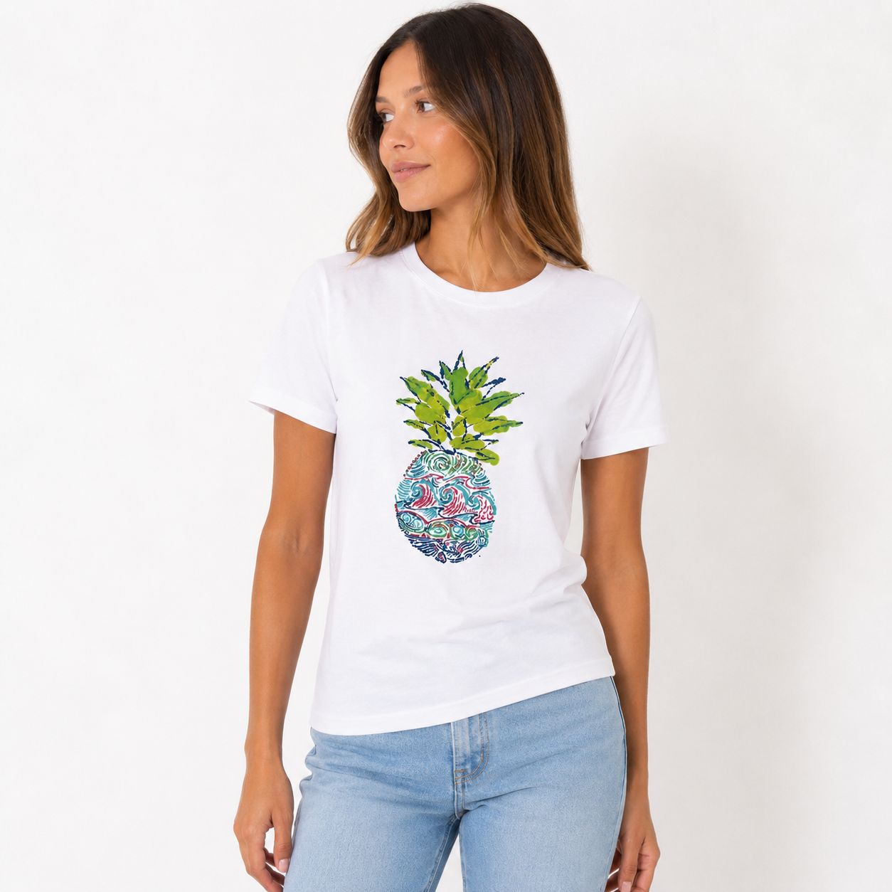 Caribbean Joe's white blouse features a pineapple graphic