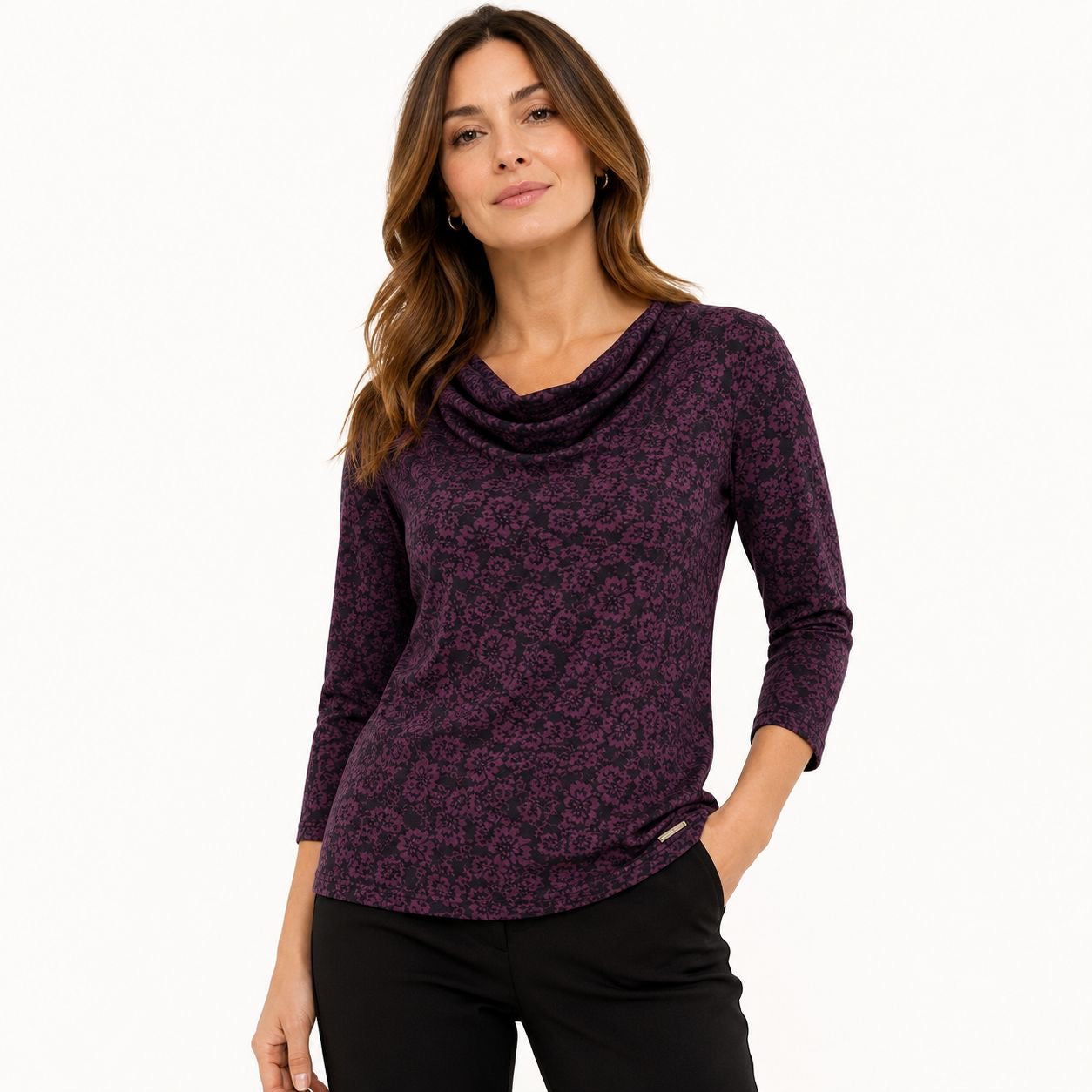 Anne Klein brand blouse has a dark floral design