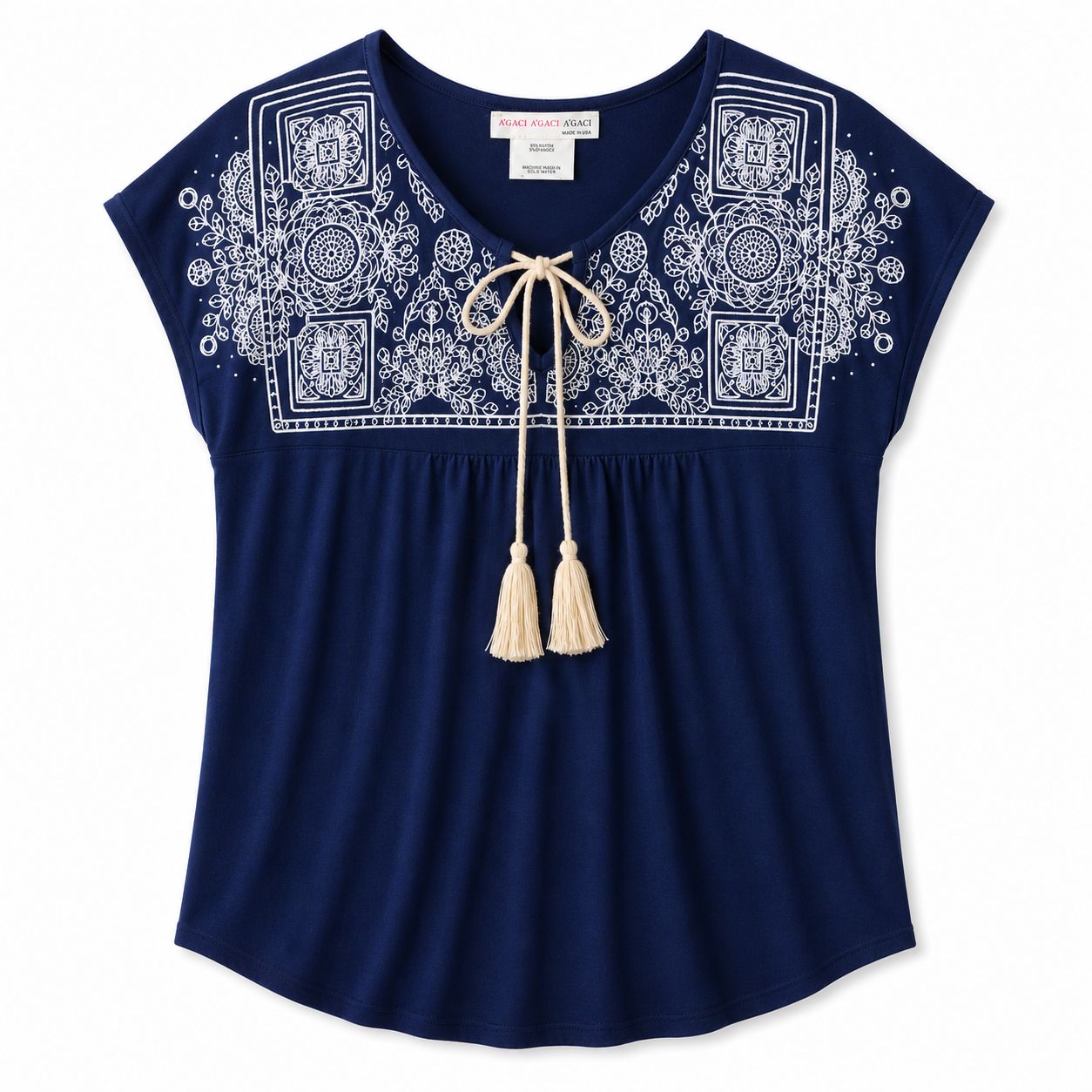 Agaci blouse is navy blue with white embroidery on the collar
